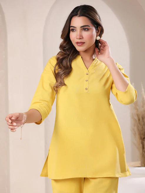 Saheli Yellow Cotton Blend Solid A-line Top